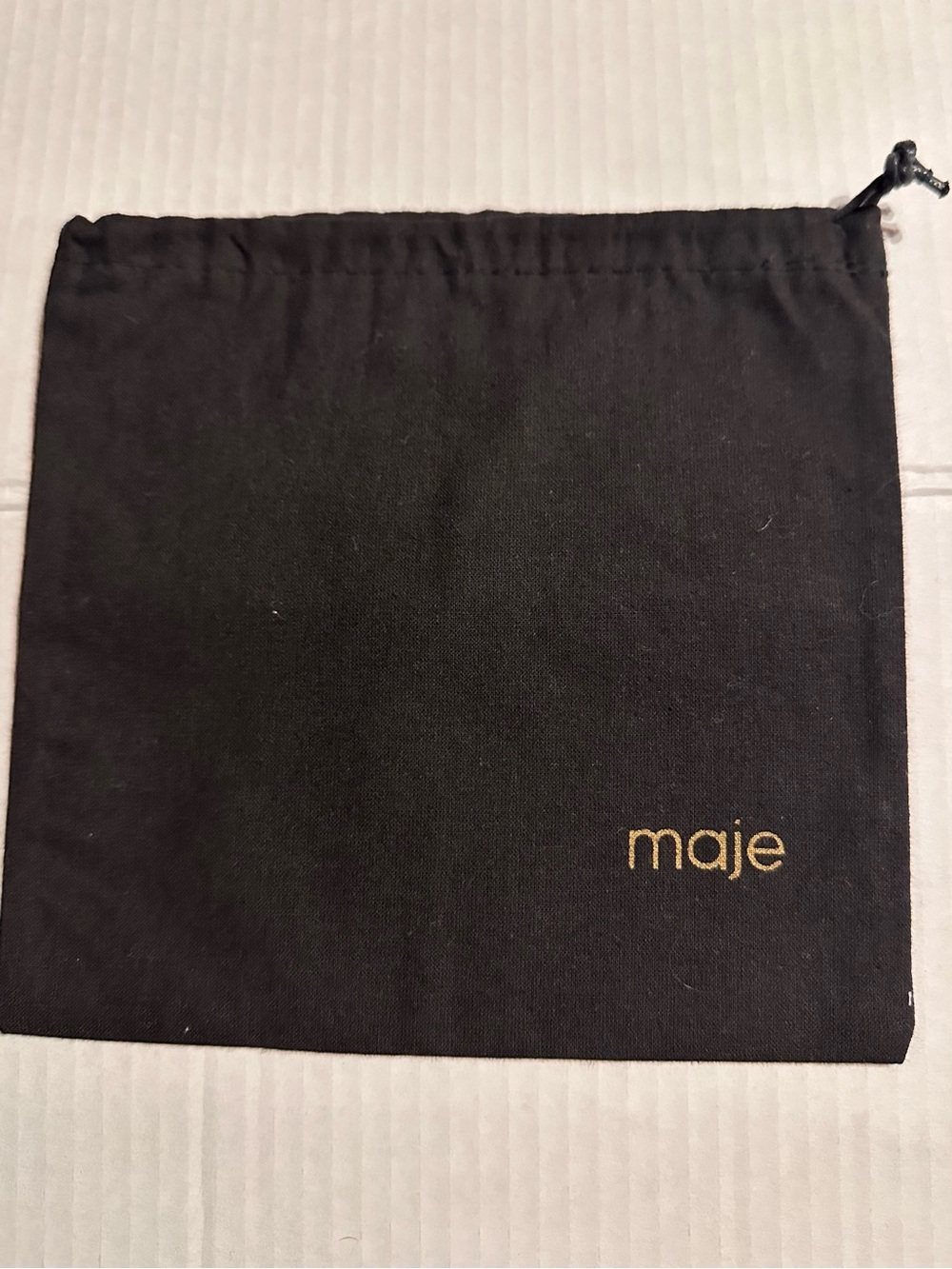 Maje Black Drawstring Pouch with Gold Logo